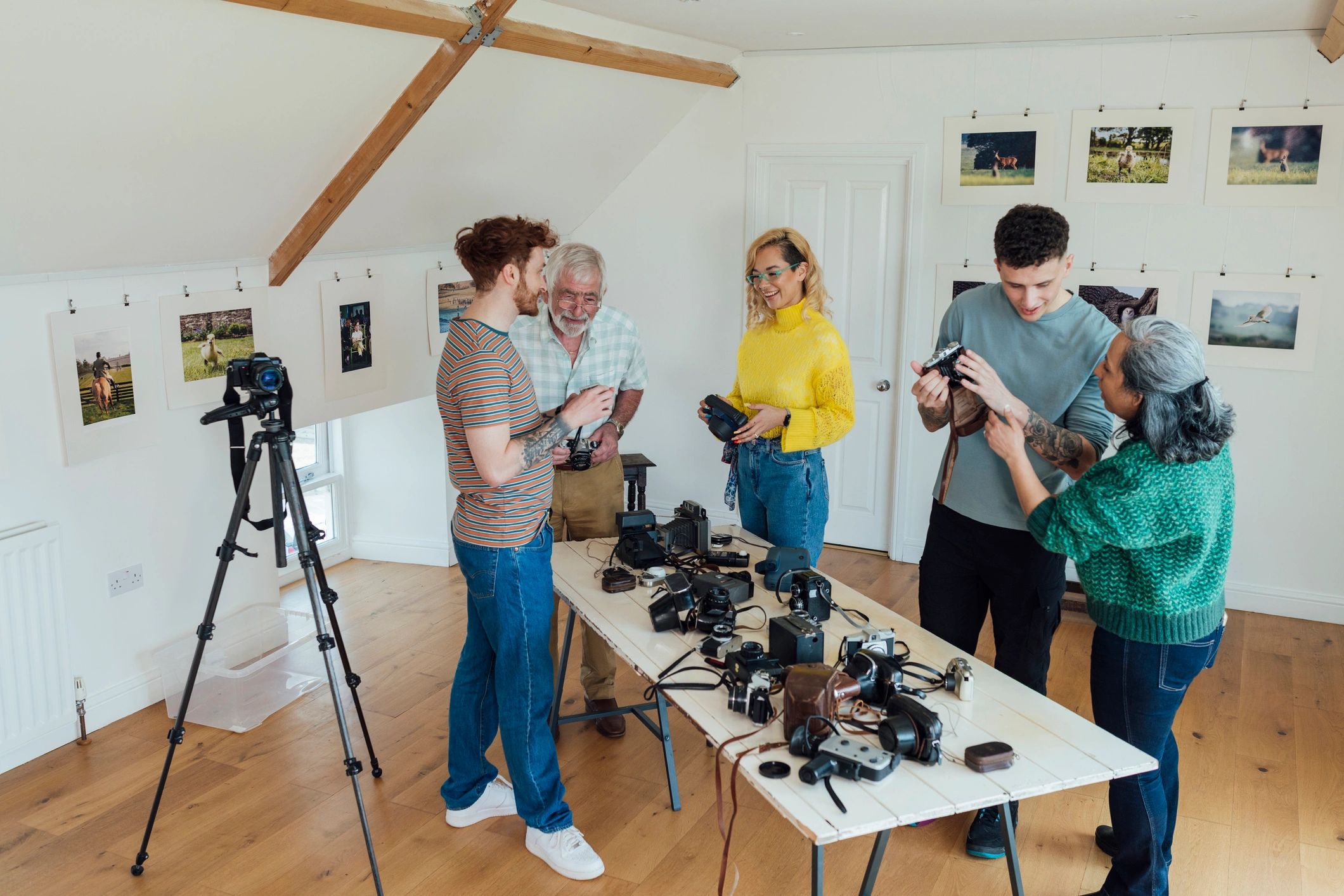 Camera club discussion in an art gallery