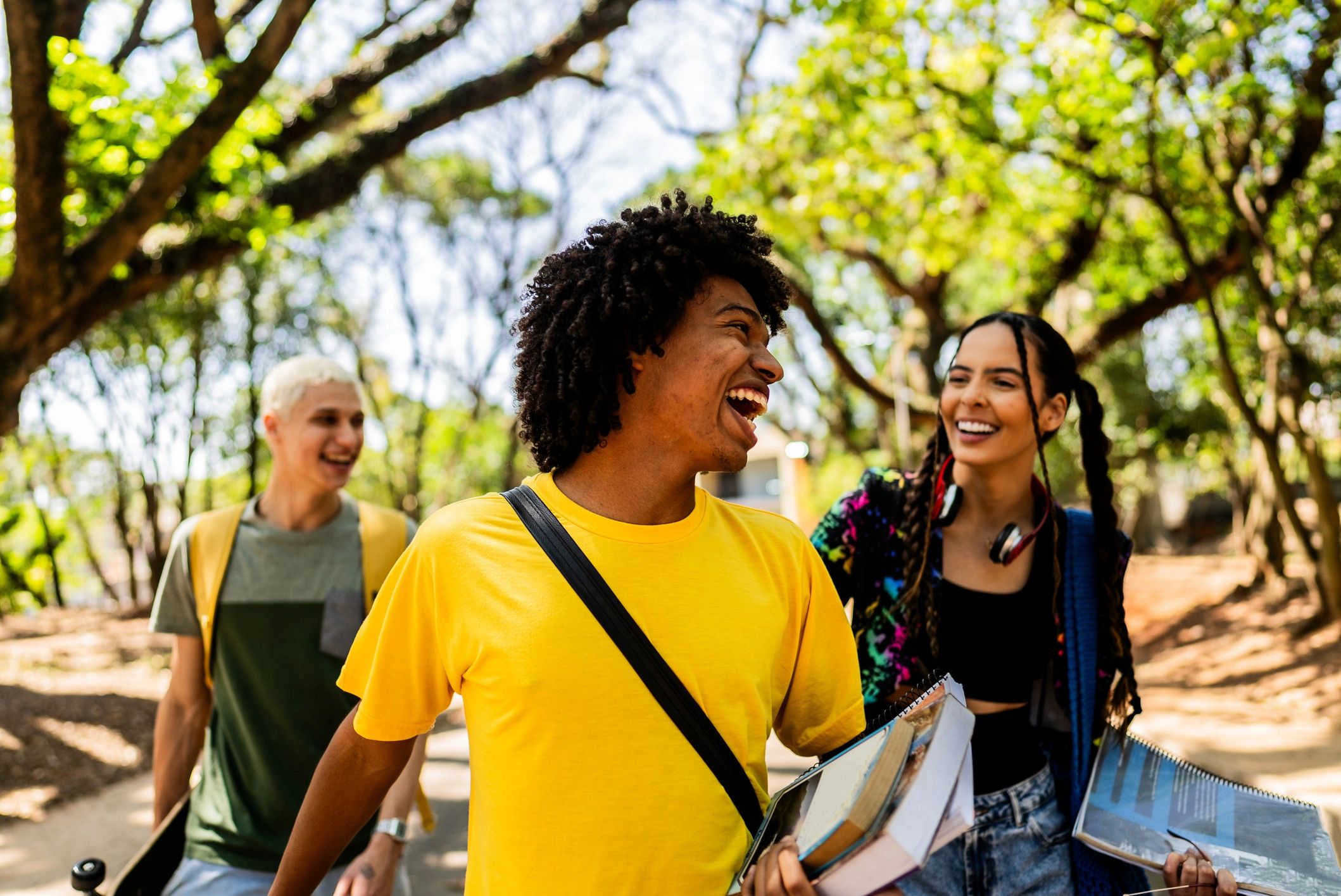 Friends walking together in a lively public space